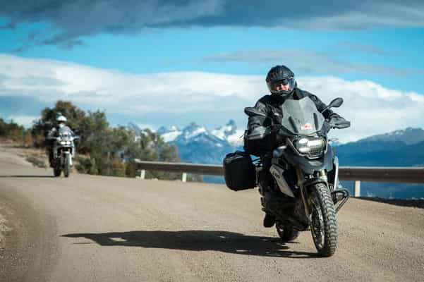 Customers bundled up in winter riding gear while traversing Patagonia.