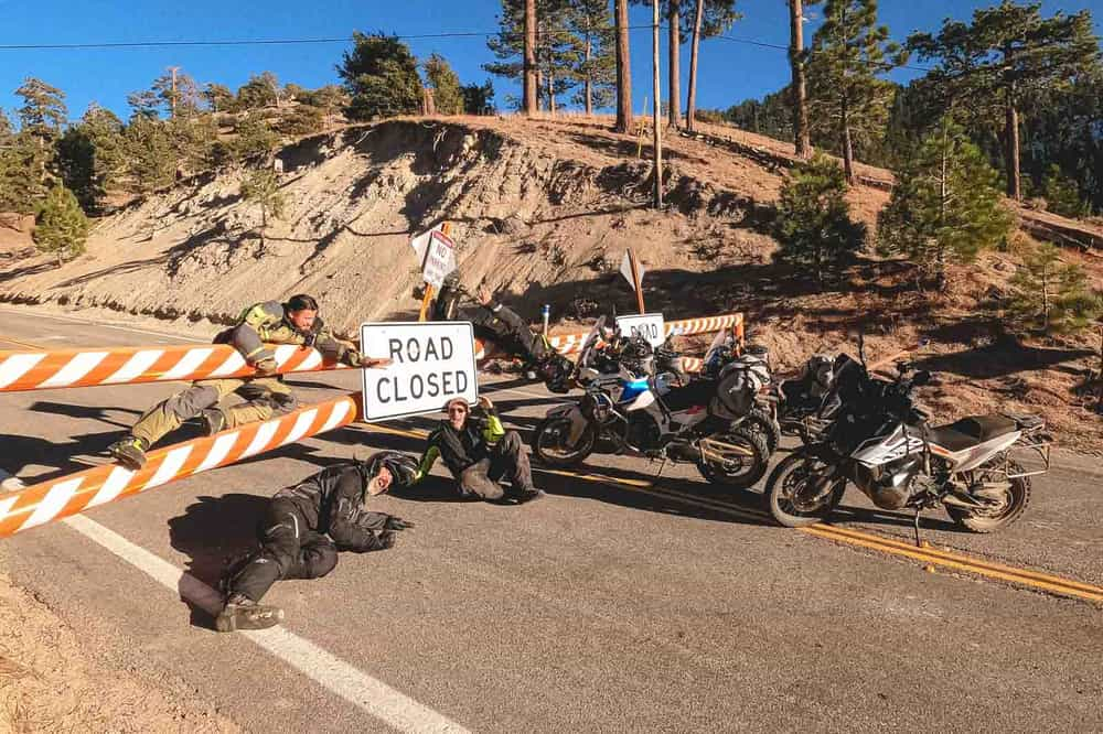 Garrett and customers goofing off after we hit a closed road on the Pacific Coast Highway. 